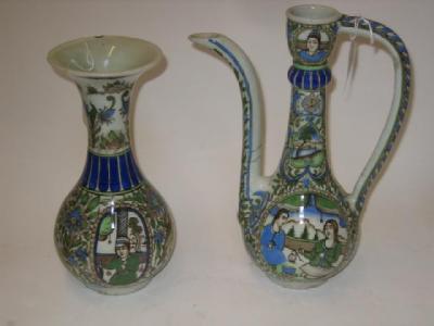 Appraisal: A QUJAR ROSE WATER EWER th century of slender baluster