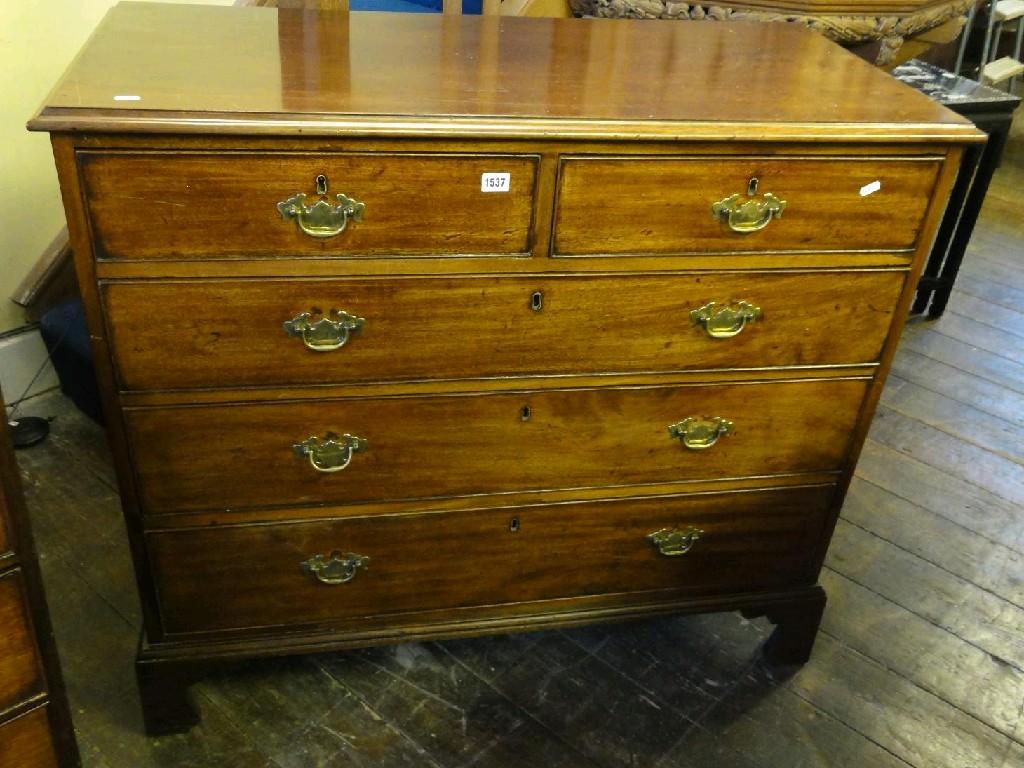 Appraisal: A Georgian mahogany chest fitted with three long and two