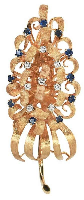 Appraisal: kt Diamond and Sapphire Brooch retro design eight round brilliant