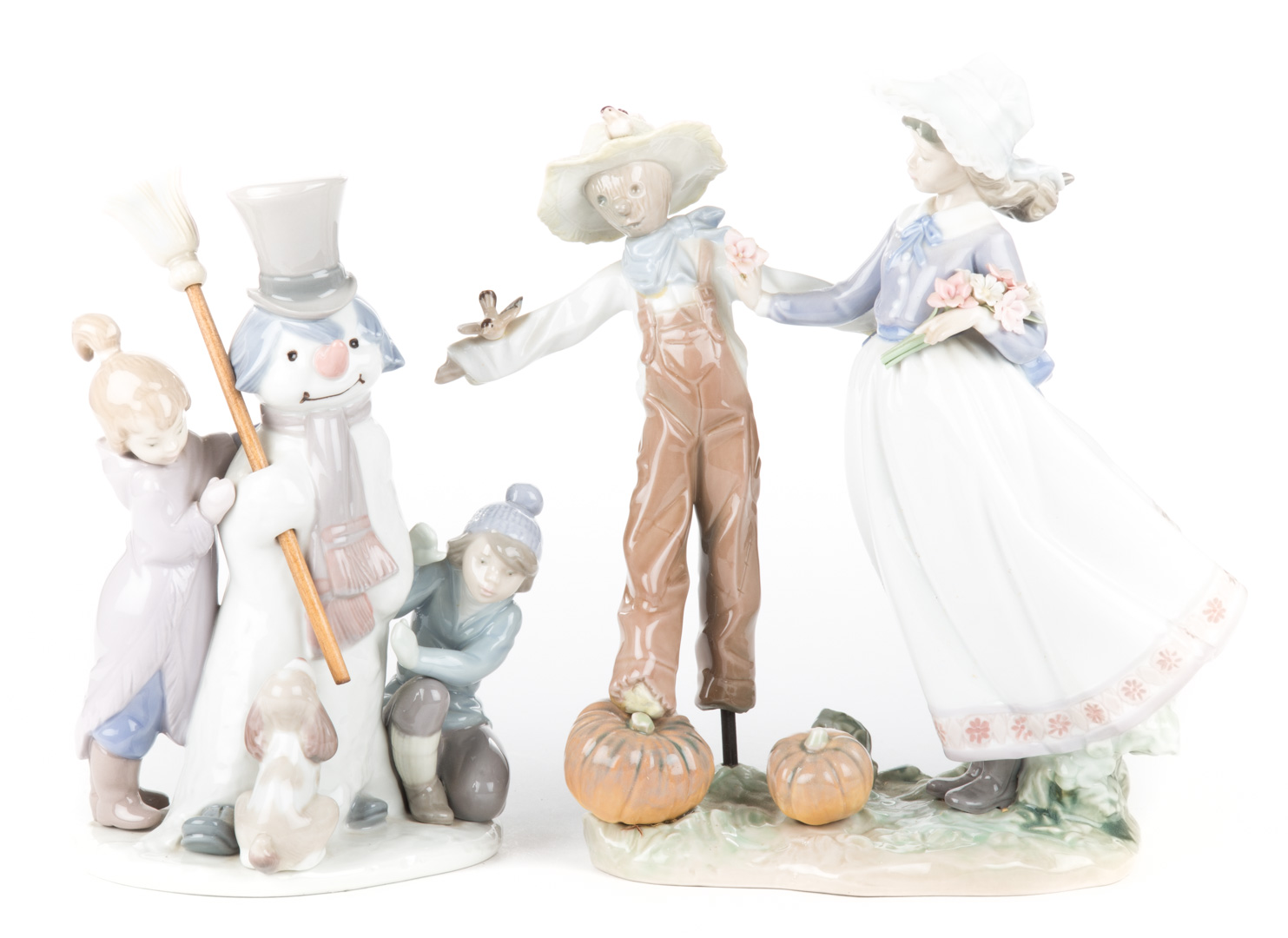 Appraisal: Two Lladro porcelain figure groups includes The Snowman and The