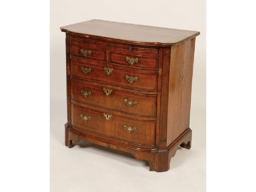 Appraisal: AN ANGLO-DUTCH WALNUT CHEST OF DRAWERS the shaped crossbanded top