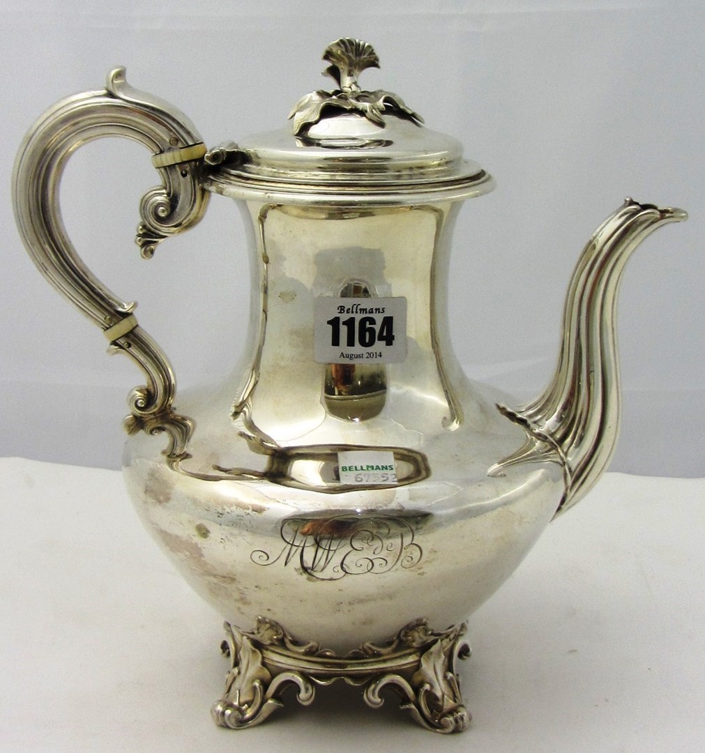 Appraisal: A William IV silver coffee pot of compressed baluster form