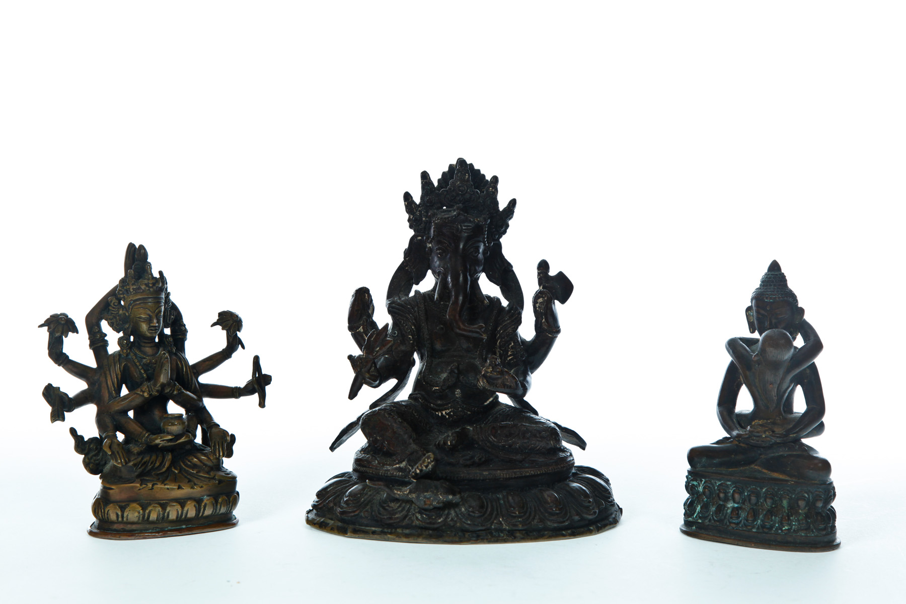 Appraisal: THREE BRONZE FIGURES Asian th century Two with metal covers