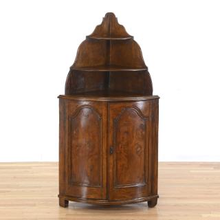 Appraisal: Continental figured walnut corner cabinet Continental figured walnut corner cabinet