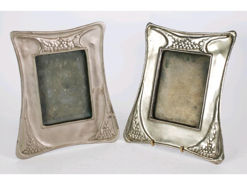 Appraisal: PAIR OF SECESSIONIST STYLE EMBOSSED SILVERED METAL PHOTOGRAPH FRAMES with