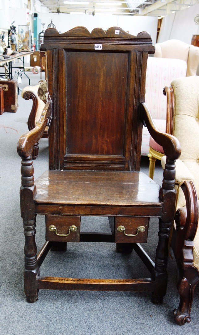 Appraisal: A Victorian oak Wainscot chair of th century style fitted