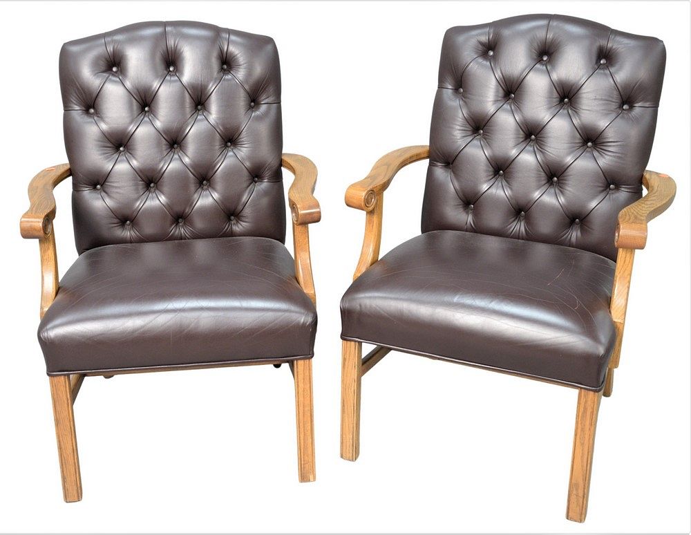 Appraisal: Pair of Oak Arm Chairs having brown leather upholstered and