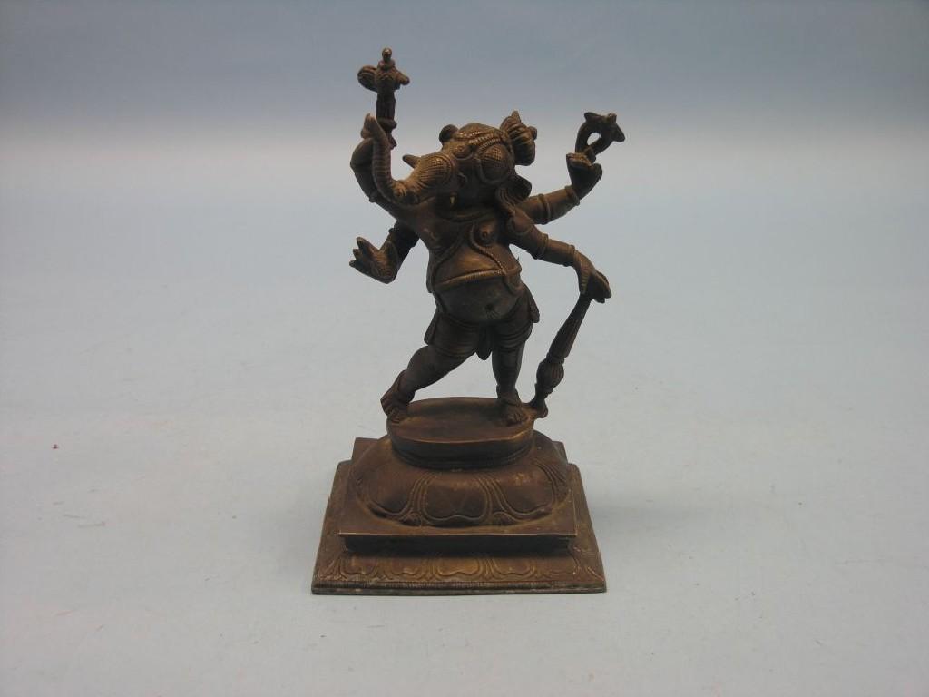 Appraisal: An Indian bronze model of Ganesh rectangular-base in