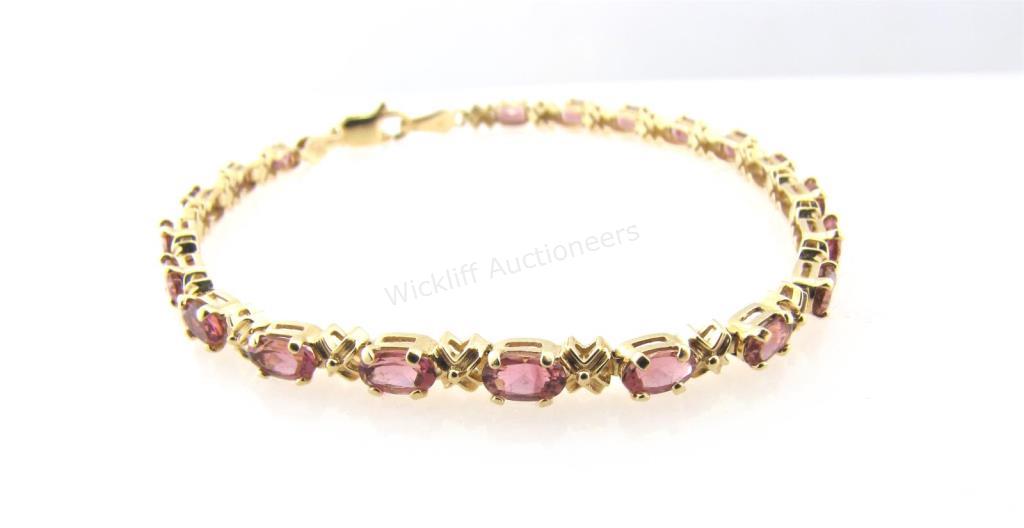 Appraisal: A K yellow gold tennis bracelet with twenty oval shaped