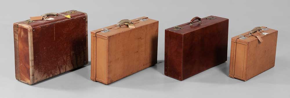 Appraisal: Four Leather Suitcases American and English th century all hard-sided