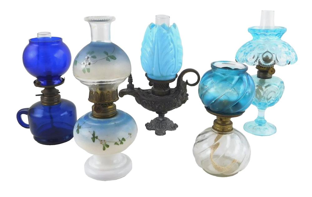 Appraisal: Miniature oil lamps all with blue shades and or fonts