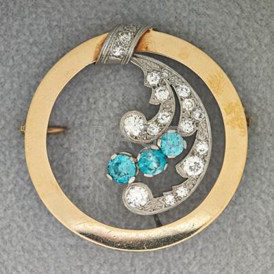 Appraisal: RETRO DIAMOND AND ZIRCON CIRCLE BROOCH ca k yg with