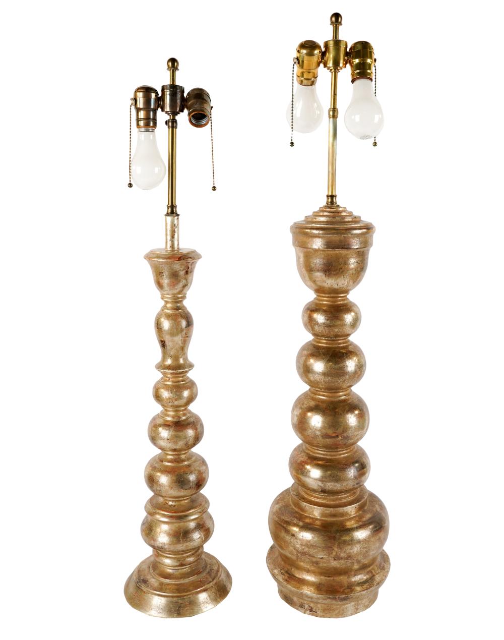 Appraisal: TWO ASSORTED SILVERED WOOD TABLE LAMPSunsigned Condition in working condition