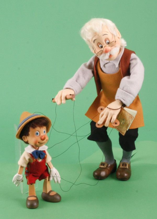 Appraisal: R John Wright Walt Disney Gepetto and wood Pinocchio Series