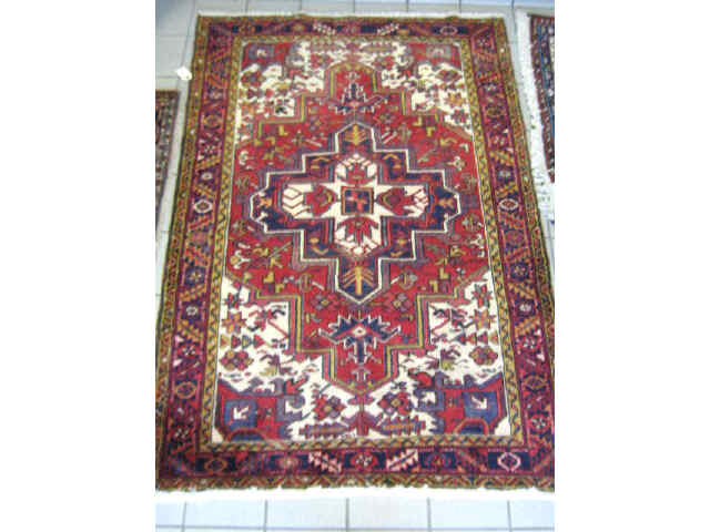 Appraisal: Heriz Persian Handmade Rug geometric designs stylized floral ' x