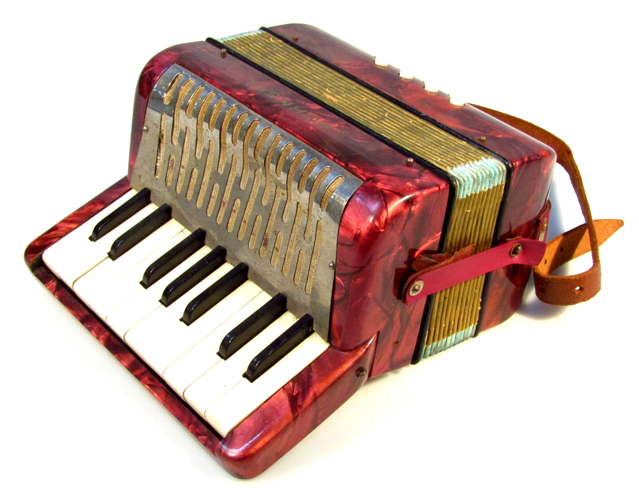 Appraisal: A child's Hohner miniature piano accordion in red marble finish