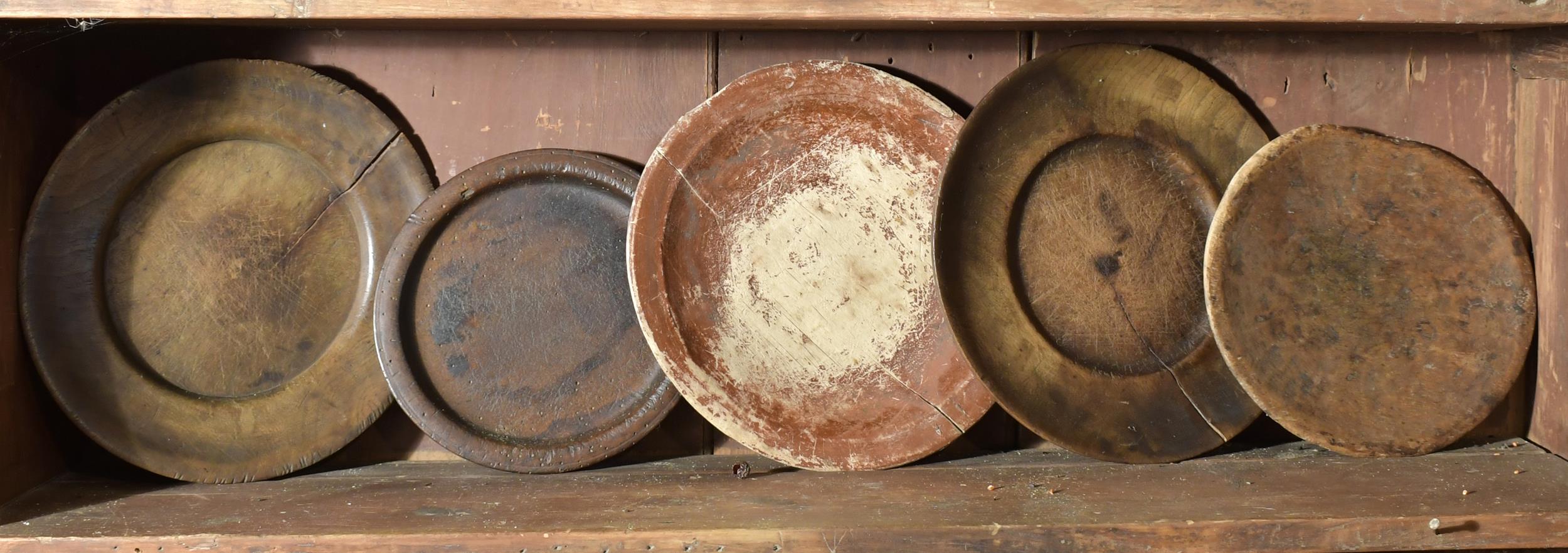 Appraisal: FIVE EARLY WOOD PLATES Round burl and treen ware some