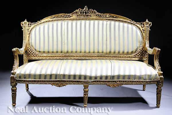 Appraisal: A Napoleon III Carved Giltwood Canap c arched C and