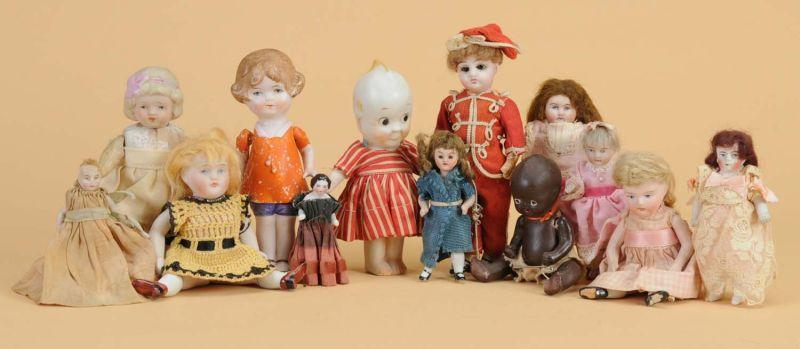 Appraisal: Lot Thirteen Small Dolls of Various Materials Germany an assortment