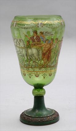 Appraisal: CONTINENTAL ENAMELED GREEN GLASS VASE ON METAL STAND The shaped