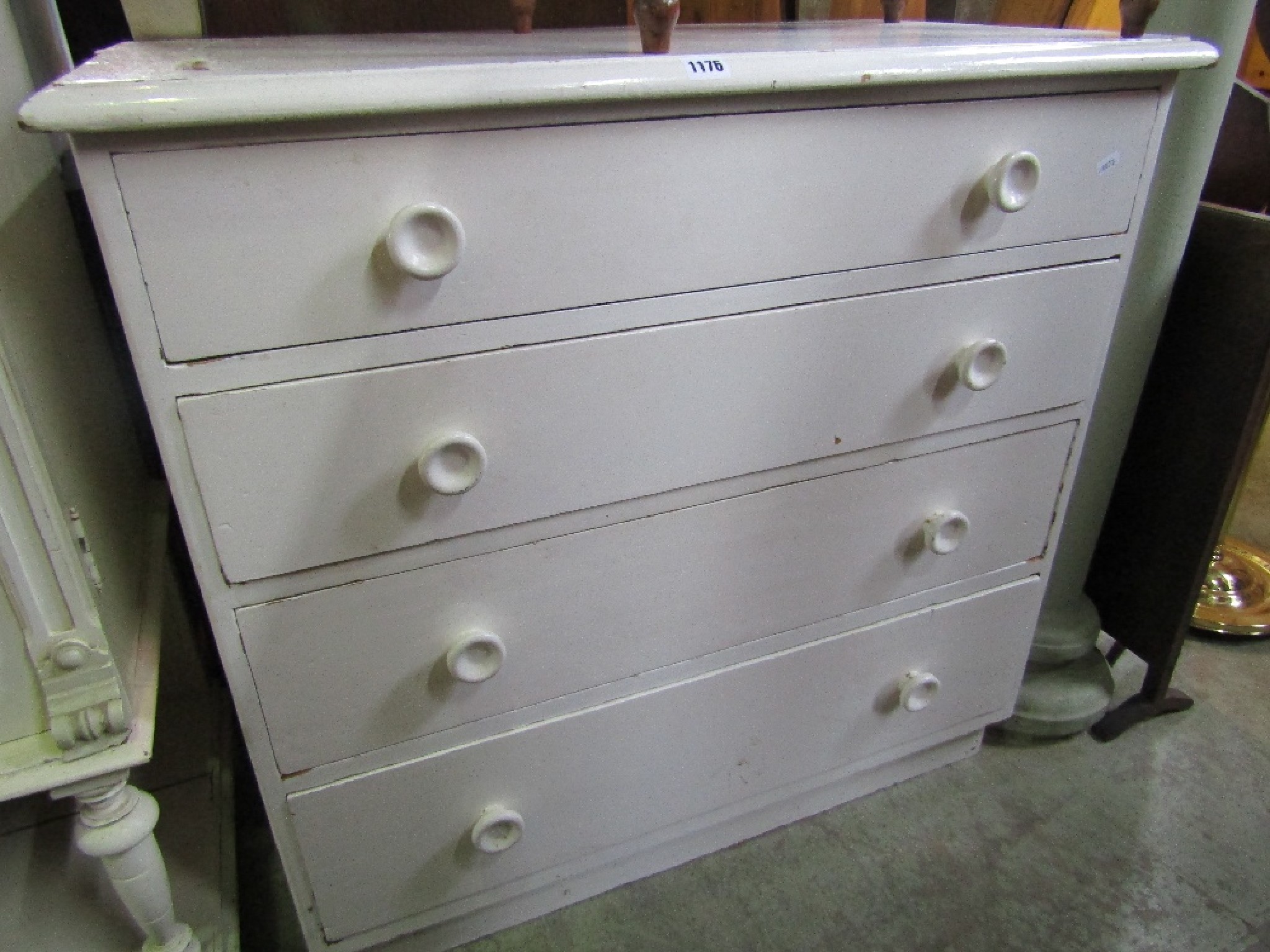 Appraisal: A vintage painted pine bedroom chest of four long graduated