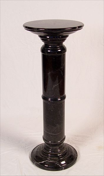 Appraisal: POLISHED BLACK MARBLE PEDESTAL Measures '' high x '' dia