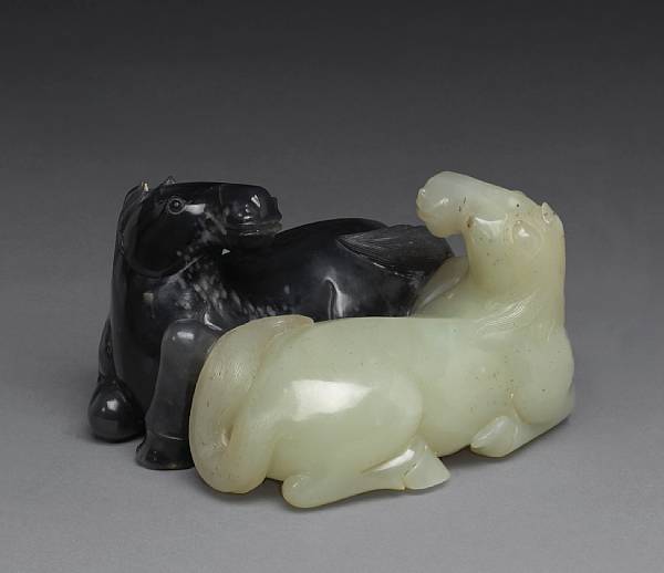 Appraisal: A white and gray jade carving of two horses Each