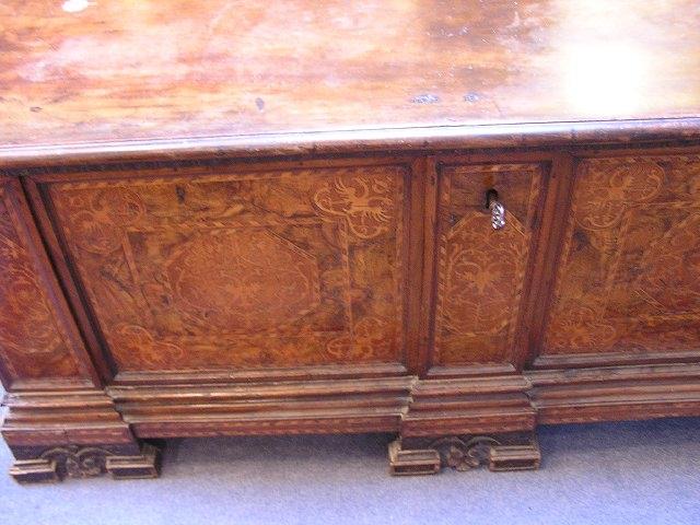 Appraisal: A TH CENTURY ITALIAN WALNUT CASSONE with hinged rising lid