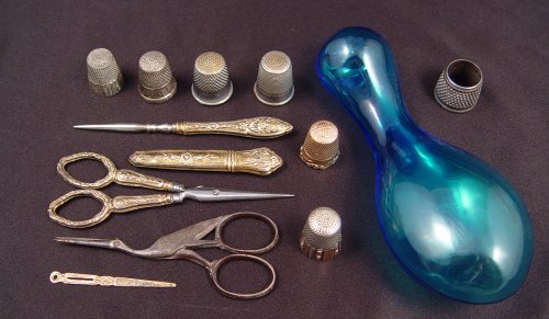 Appraisal: SEWING TOOLS THIMBLES GLASS DARNER Includes Continental silver hallmarked set