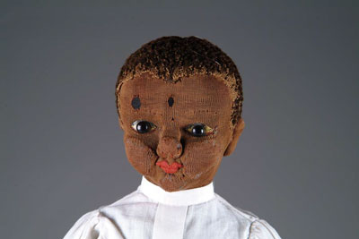 Appraisal: BLACK CLOTH BEECHER CHILD This doll attributed to Beecher This