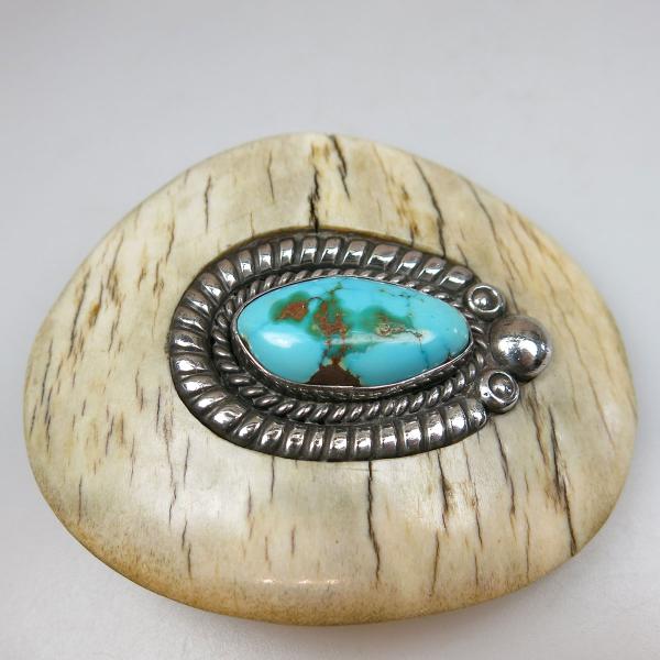 Appraisal: Navajo Bone And Silver Buckle set with a turquoise cabochon