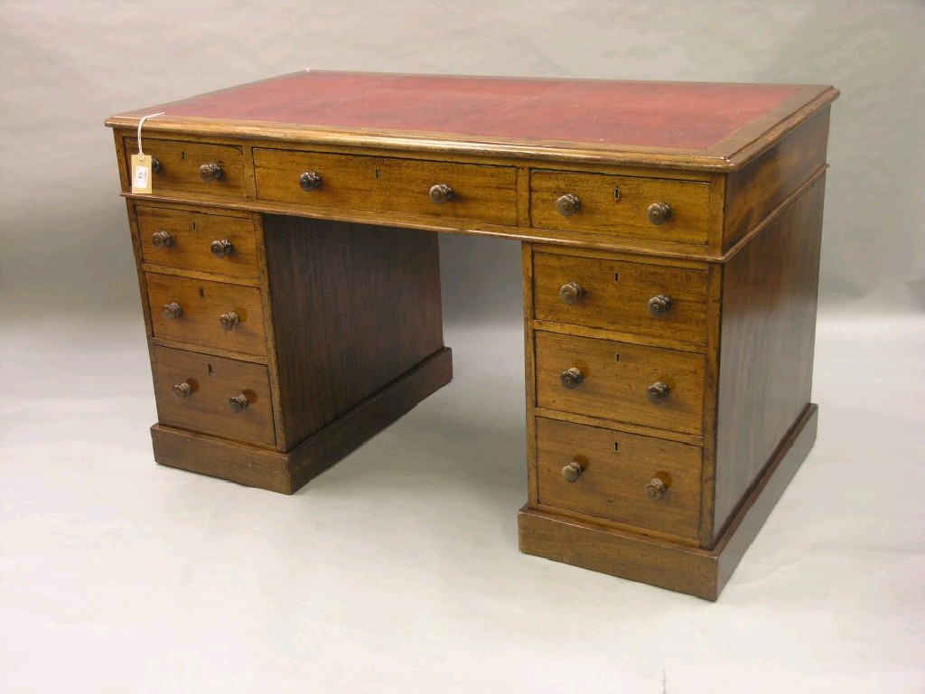 Appraisal: A Victorian solid mahogany pedestal desk the top with inset