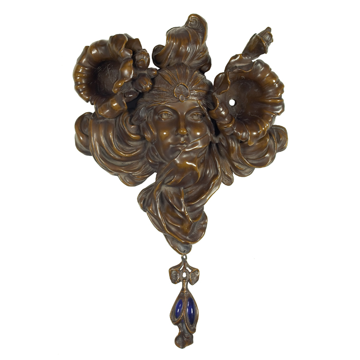 Appraisal: Art Nouveau sconce in bronze female face flanked by two