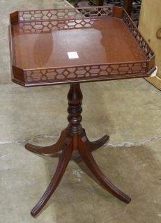 Appraisal: Regency style mahogany tea table having a pierced gallery top