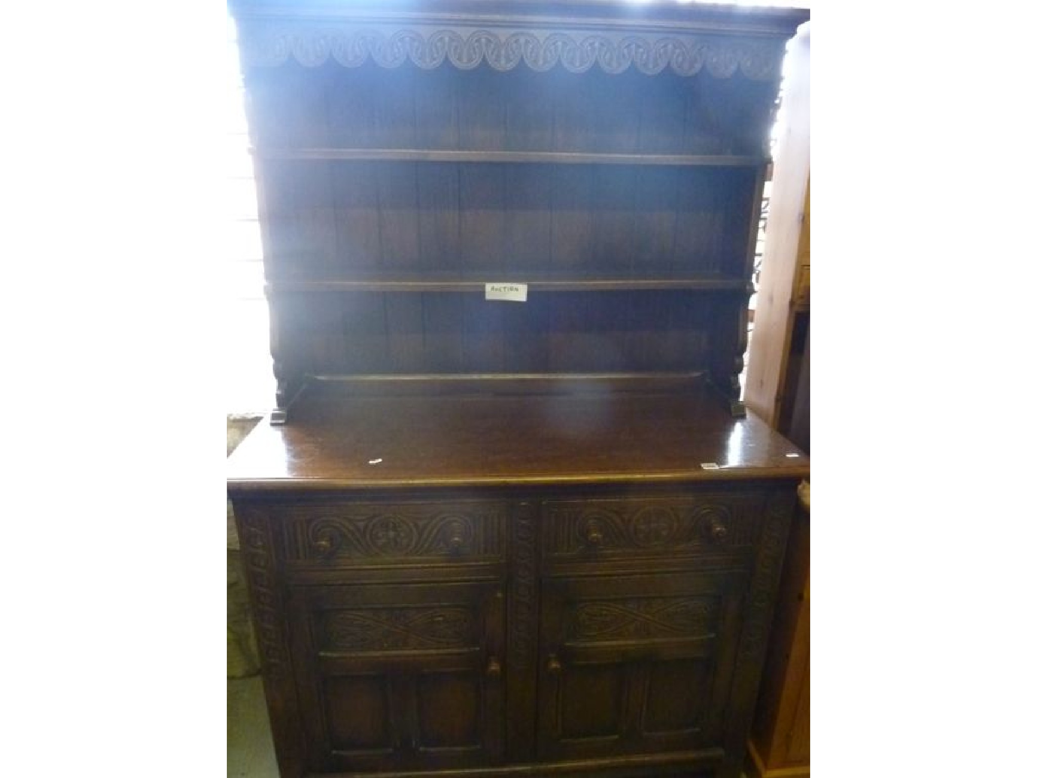 Appraisal: A good quality reproduction oak cottage dresser in the Old