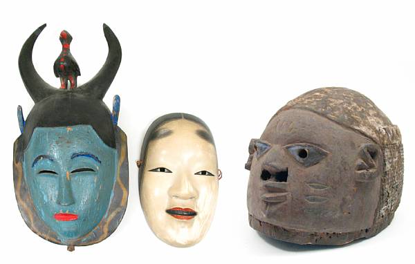 Appraisal: A group of two Asian masks together with another mask