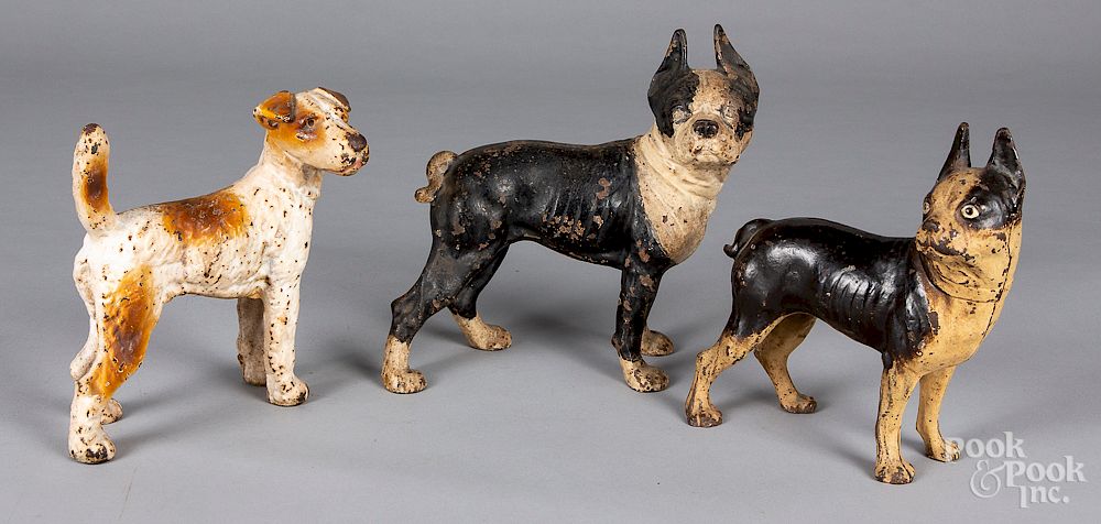 Appraisal: Three cast iron dog doorstops Three cast iron dog doorstops