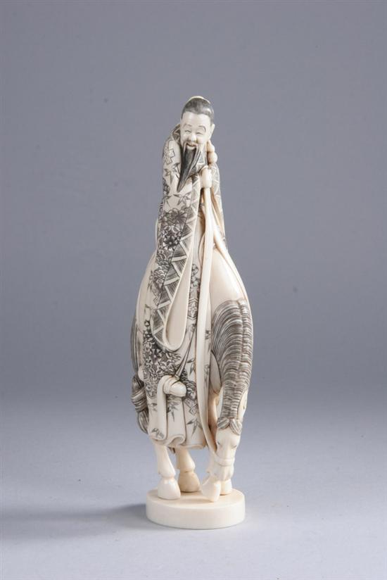 Appraisal: JAPANESE IVORY OKIMONO OF MAN AND HORSE th century -