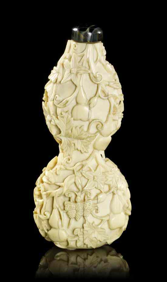 Appraisal: An Ivory Double Gourd-Form Snuff Bottle having carving in high