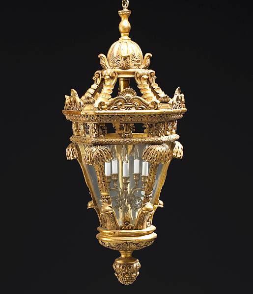 Appraisal: A Baroque style giltwood and glass lantern The tapering octagonal