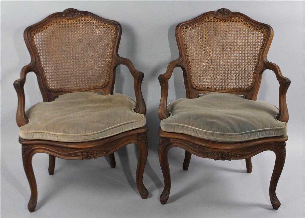 Appraisal: PAIR OF LOUIS XV STYLE FAUTEUIL CANE CHAIRS having a