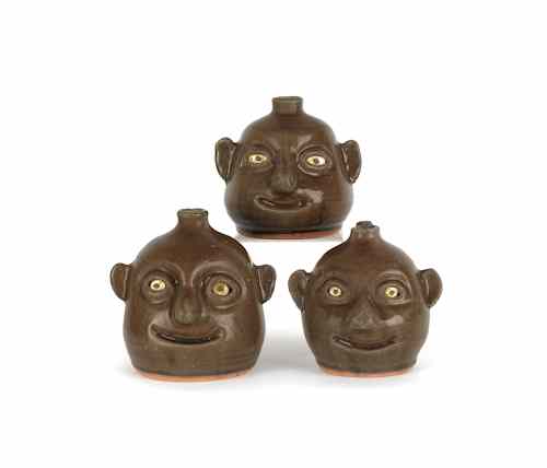 Appraisal: Three Georgia stoneware face jugs by Reggie Meaders all signed