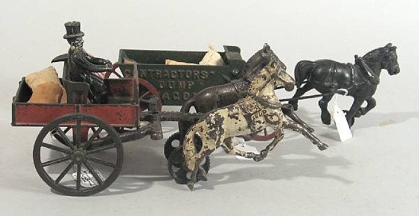 Appraisal: Cast iron Horse drawn grouping Lot features a cast iron