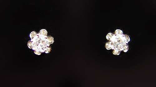 Appraisal: K CTW DIAMOND SOLITAIRE EARRINGS K white gold earrings contain