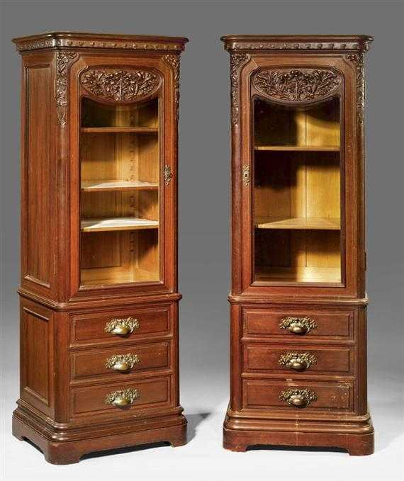 Appraisal: FRENCH PAIR OF CARVED MAHOGANY DISPLAY CABINETS Art Nouveau circa