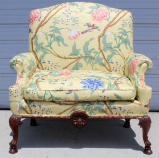 Appraisal: Chippendale style floral upholstered settee Chippendale style floral upholstered settee