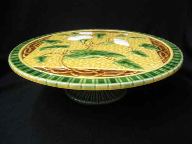 Appraisal: Majolica Pottery Cake Stand floral decor pedestal base '' diameter