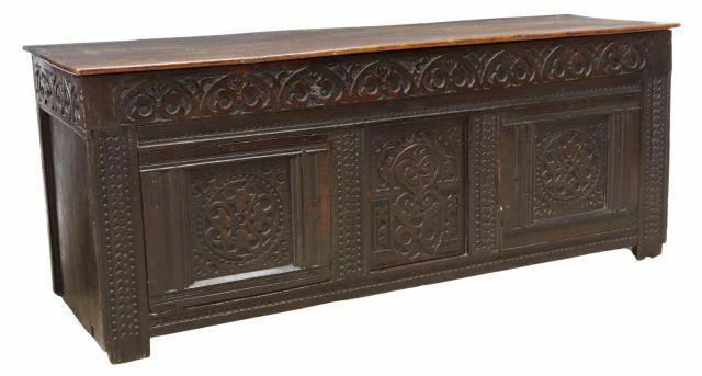 Appraisal: English carved oak coffer th c and later elements having