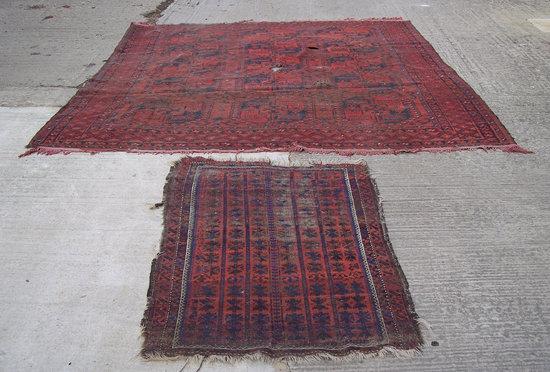 Appraisal: A Turkoman rug of crimson ground the central geometric field