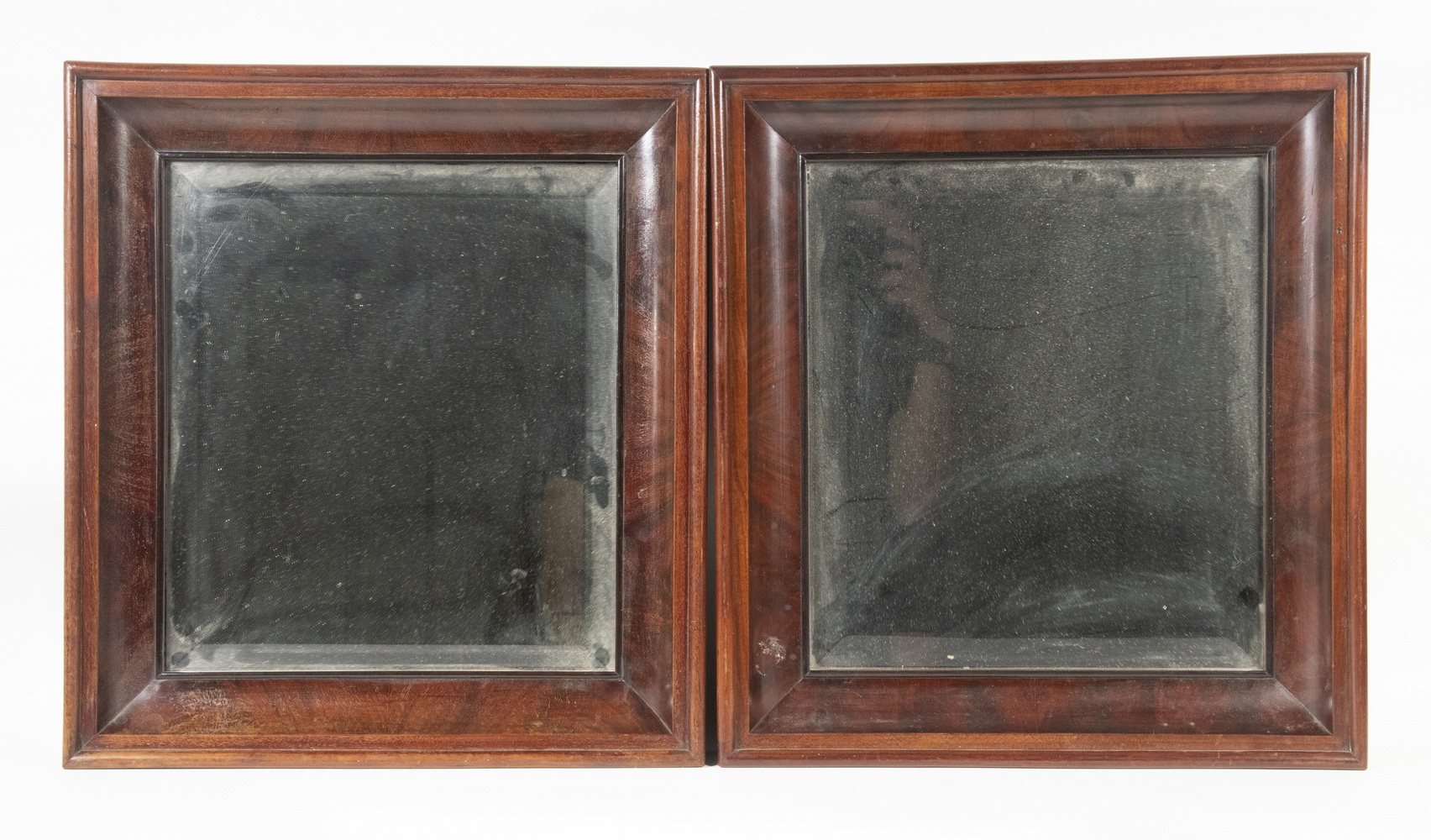 Appraisal: PR MAHOGANY OGEE MIRRORS Pair Beveled Mirrors in fancy th